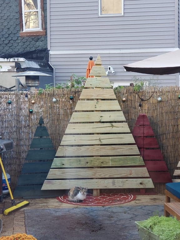Wood outdoor Christmas tree in yard