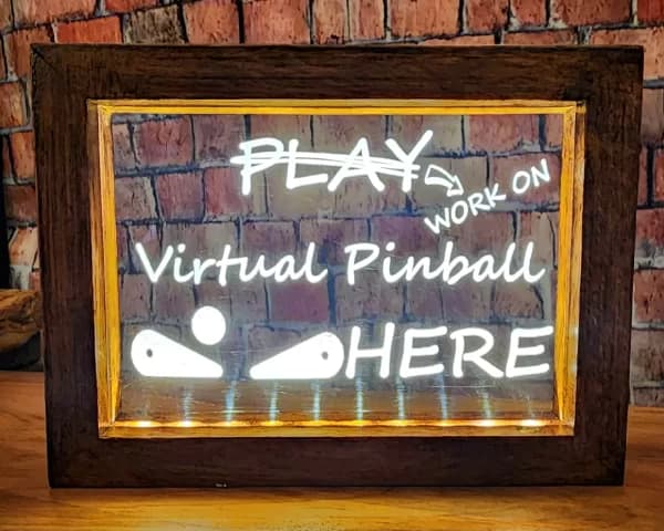 Handmade Pinbuilders Pride illuminated acrylic sign in a stained beechwood frame