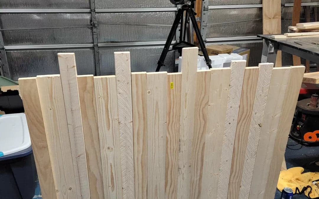 Partially assembled dark wood basement bar base during construction