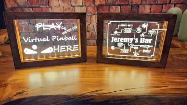 Handmade illuminated Pinbuilders Pride and Pacman acrylic sign designs