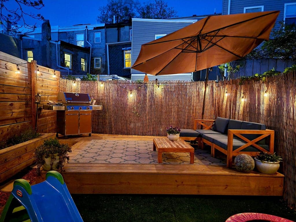 Vertical garden wall with mixed real and artificial plants