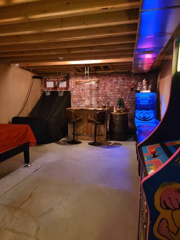 Basement ceiling with exposed beams before installation
