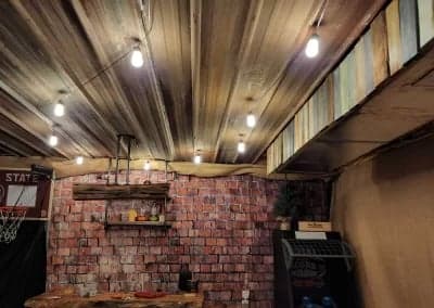 Corrugated metal ceiling with installed patio string lights