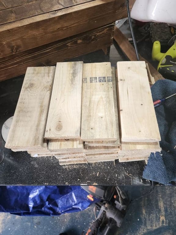 Applying the base layer of paint to wood