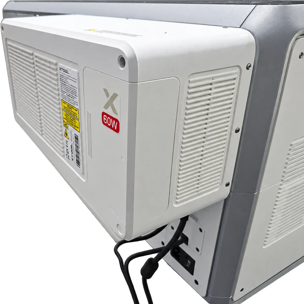 The 60W MOPA pack mounted on the rear of our xTool X1, with the workshop background removed